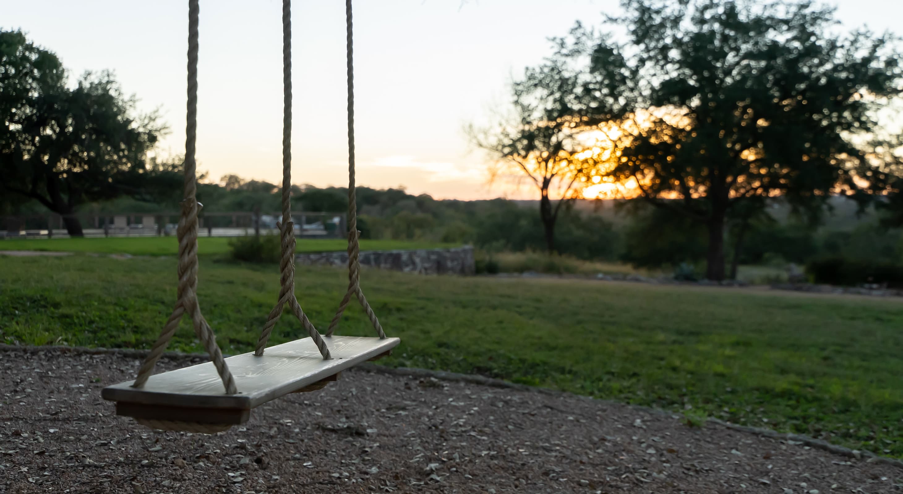 Swing with sunset views at our Inn Near Austin, TX